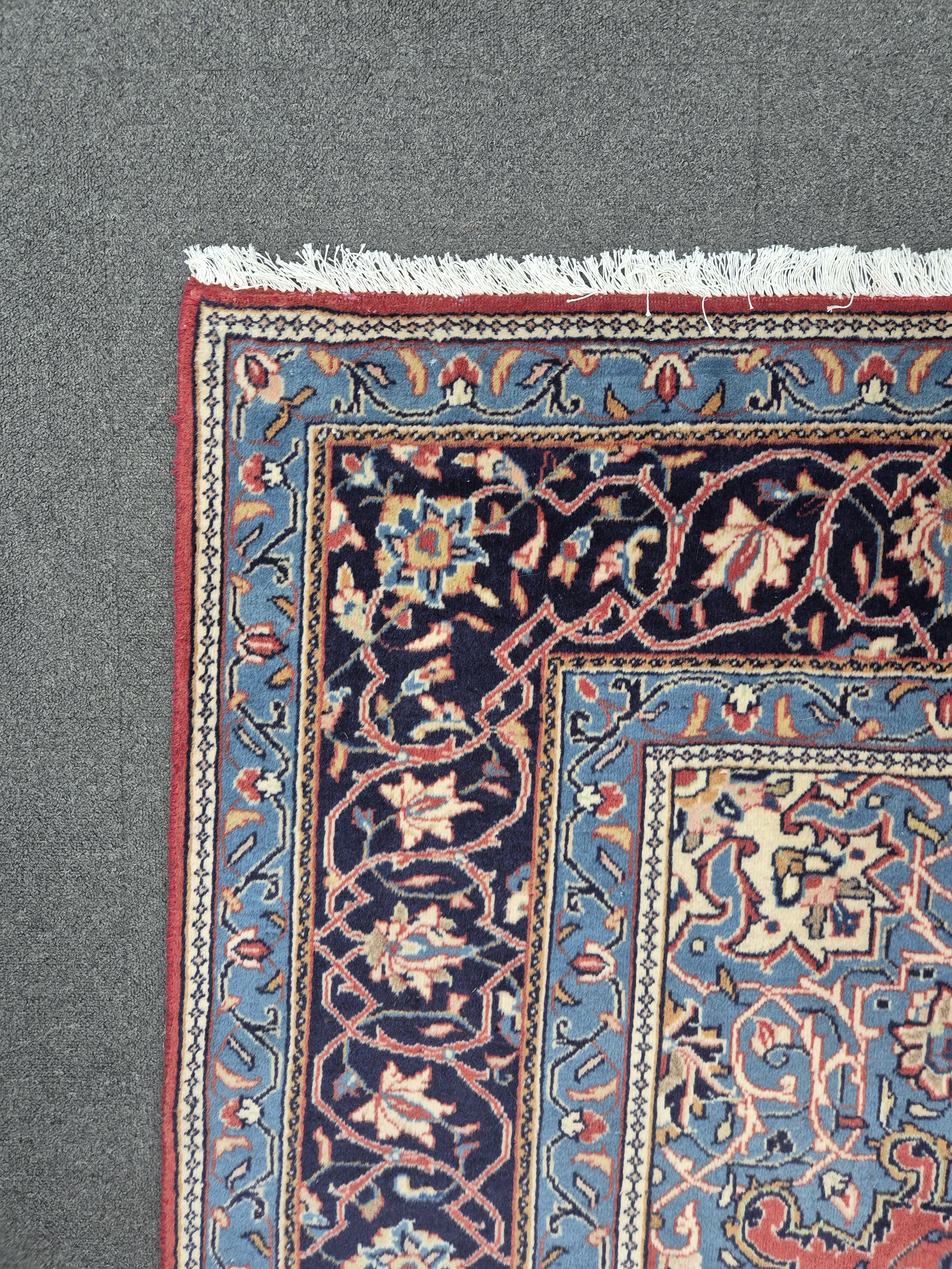 A Sarough brick red ground carpet, 340 x 250cm. Condition - good